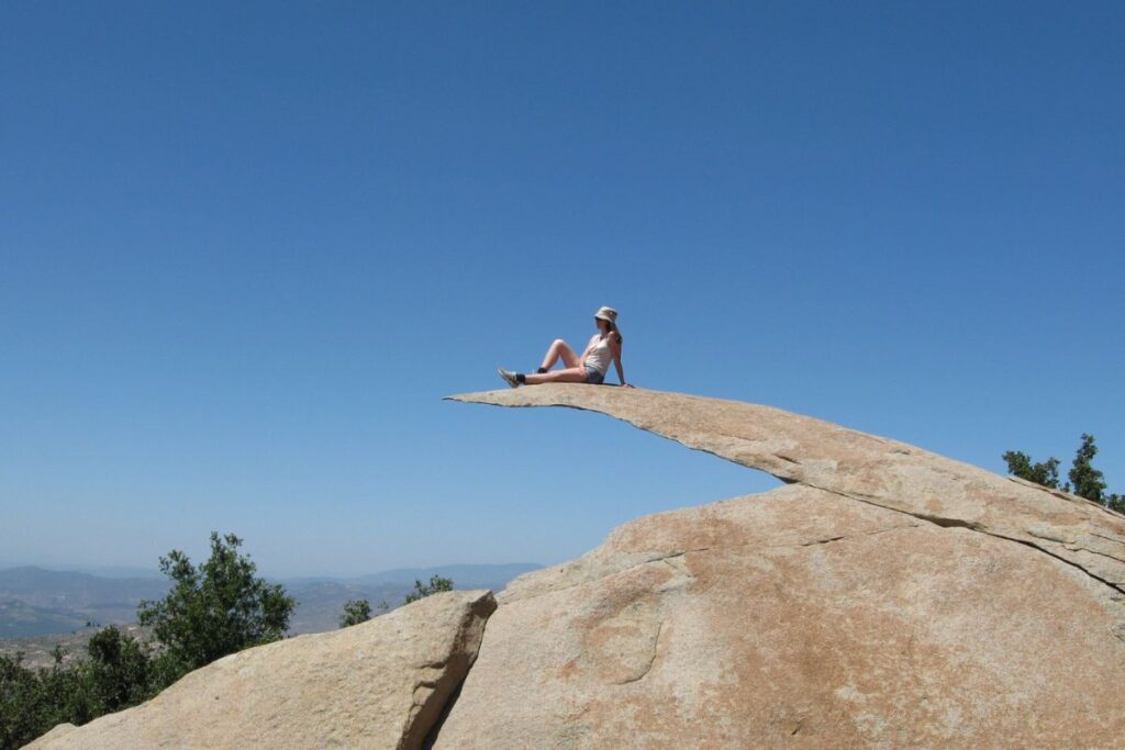 A person sitting on Potato Chip Rock
