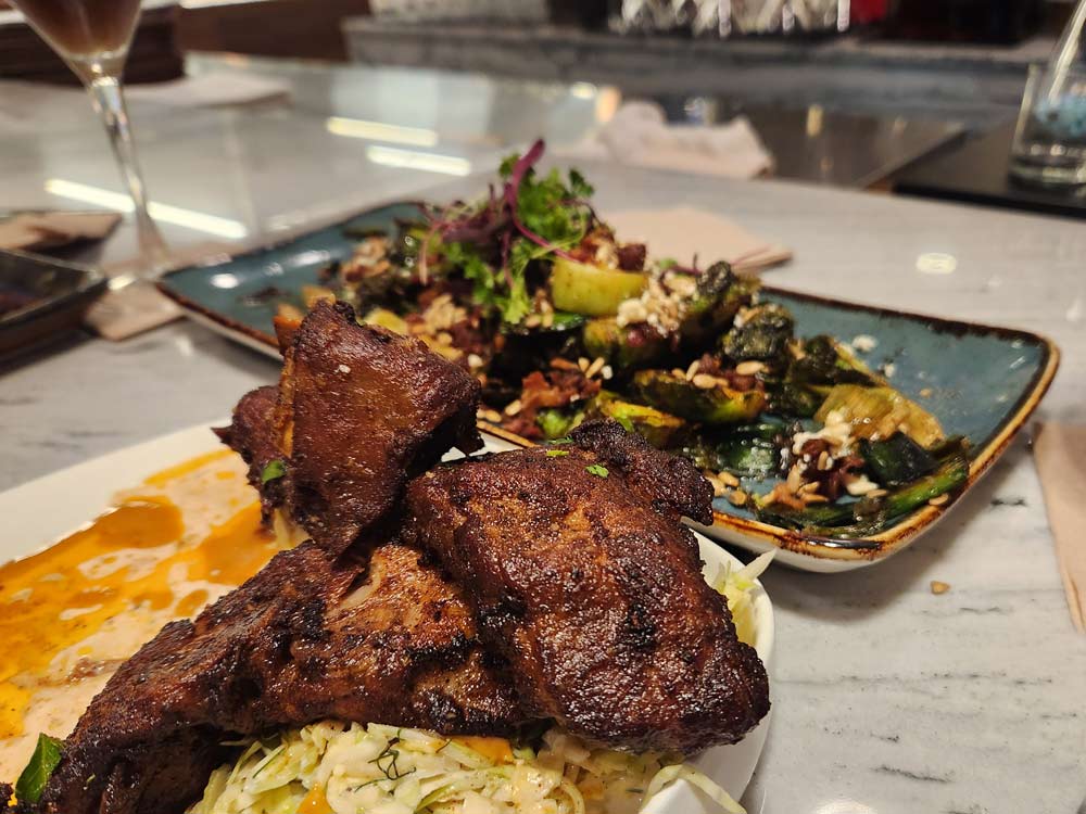 Bourbon Maple Bacon Brussels sprouts and The Pork Wings from The Lab Collaborative