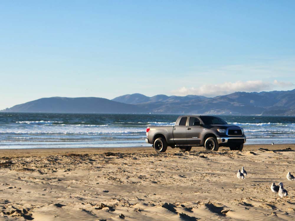 A truck on the beach