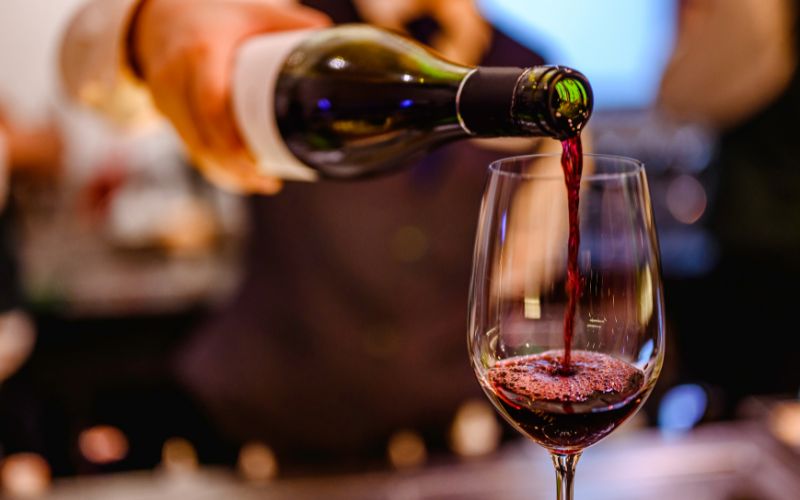 Pouring wine into a glass